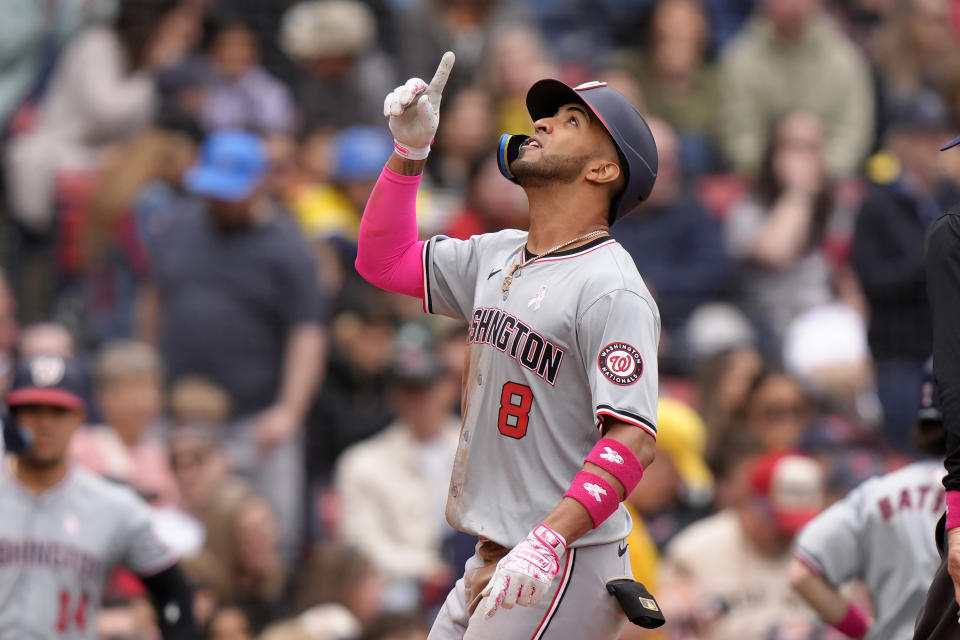 Washington Nationals' Eddie Rosario celebrates as he arrives home to score on his two-run home run in the fourth inning of a baseball game against the Boston Red Sox, Sunday, May 12, 2024, in Boston. (AP Photo/Steven Senne)