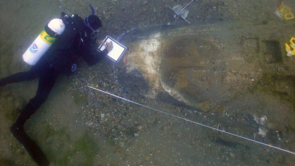Divers next plan to recover the aircraft's two wings, which separated from the fuselage in the crash and now lie together on the floor of the lake.