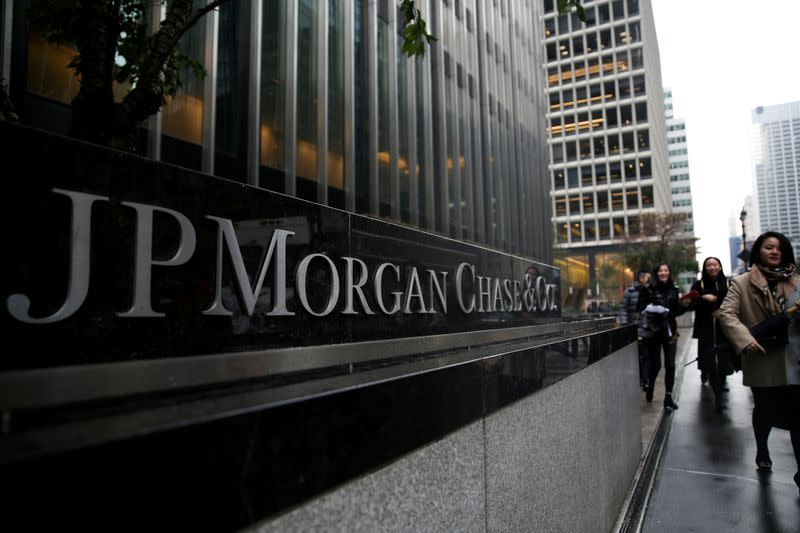 FILE PHOTO: A sign of JP Morgan Chase Bank is seen in front of their headquarters tower in New York