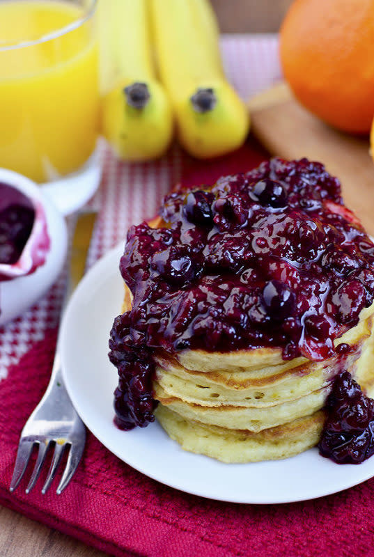 <p>Orange pancakes with berry-orange sauce are packed with bright, fresh flavors and are incredibly light and fluffy. The perfect weekend breakfast!</p><p><strong>Get the recipe: <a href="https://iowagirleats.com/orange-pancakes-with-berry-orange-sauce/" rel="nofollow noopener" target="_blank" data-ylk="slk:Orange Pancakes with Berry-Orange Sauce;elm:context_link;itc:0;sec:content-canvas" class="link rapid-noclick-resp"><em>Orange Pancakes with Berry-Orange Sauce</em></a></strong></p>