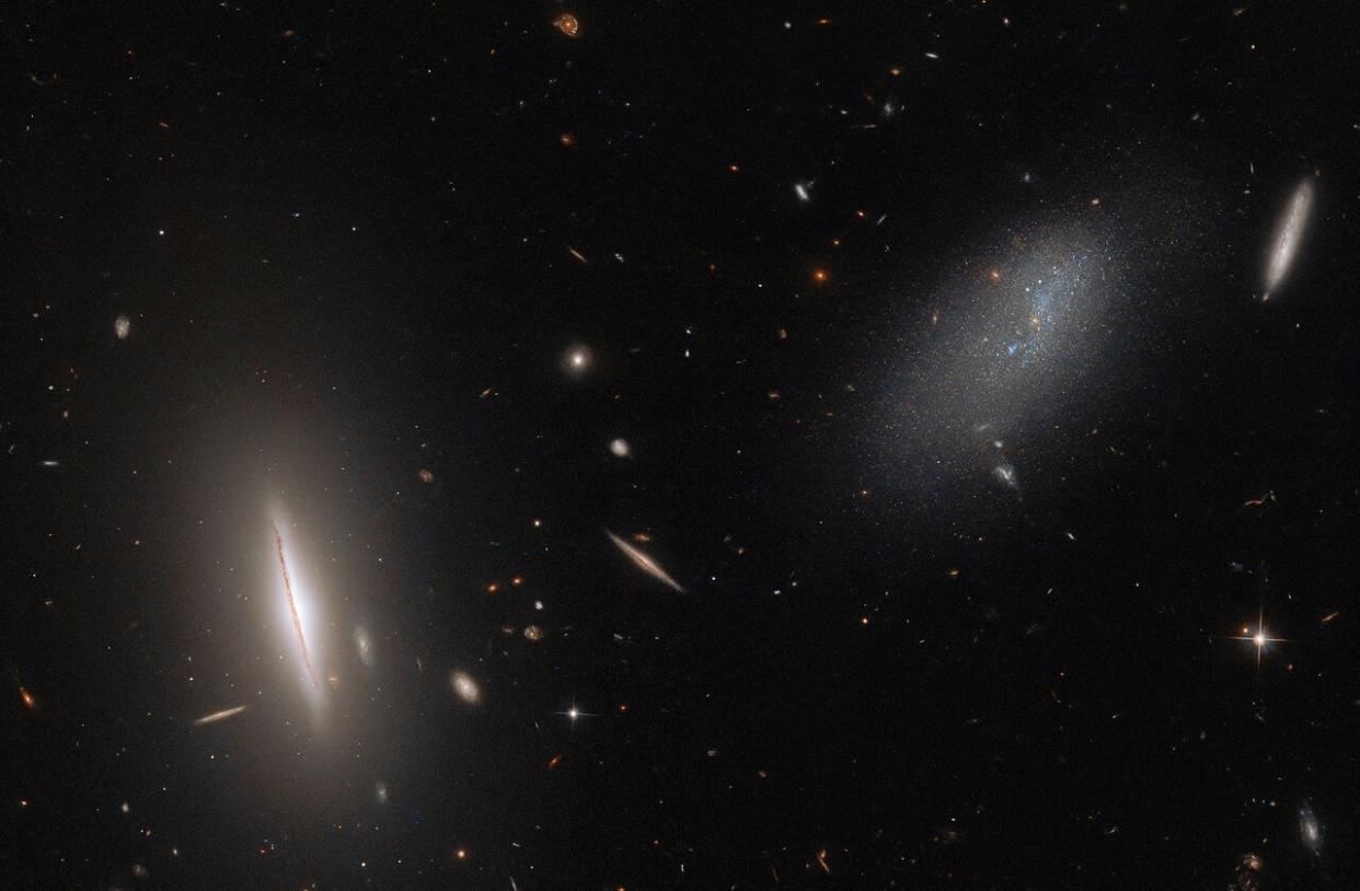  This image from the Hubble Space Telescope features the galaxy LEDA 48062 (right) and galaxy UGC 8603 (left).  