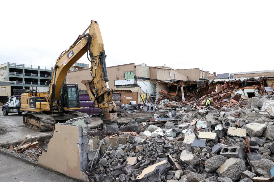 Crews demolish the former Union Gospel Mission in December 2022.