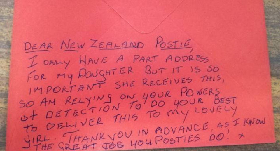 Christmas letter miracle: The letter writer asked the postie for help in a handwritten note on the back of the envelope (pictured). 