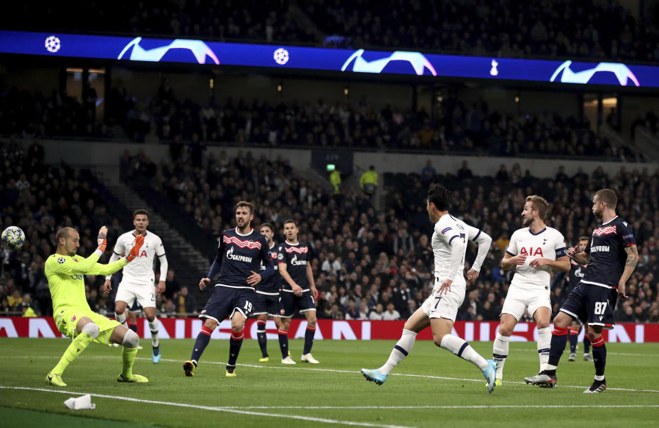 Tottenham Hotspur's Son Heung-min, center, scores his side's second goal of the game during the Champions League Group B match against Red Star at Tottenham Hotspur Stadium, London, Tuesday Oct. 22, 2019. (Nick Potts/PA via AP)