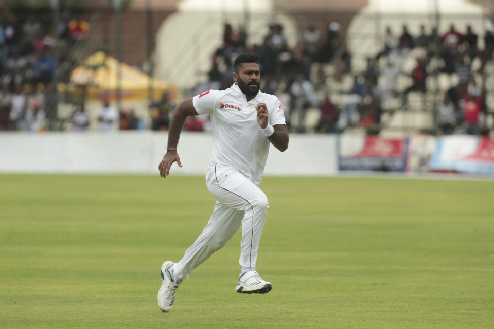 Sri Lanka player Lahiru Kumara chases the ball during the test cricket match against Zimbabwe at Harare Sports Club, Sunday, Jan,19, 2020. Zimbabwe won the toss and elected to bat in its first match since the International Cricket Council lifted the country's ban last year. (AP Photo/Tsvangirayi Mukwazhi)