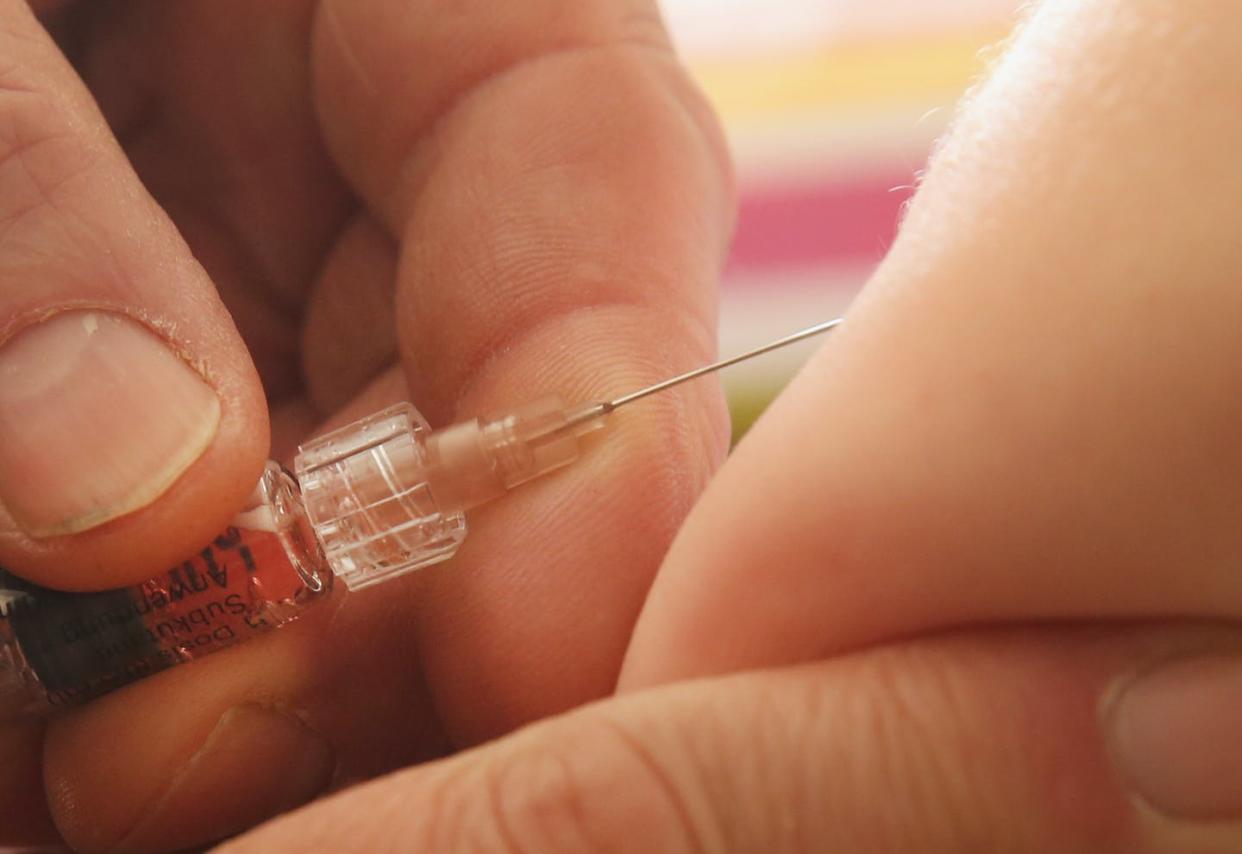 <span class="caption">The widespread fear of needles is a public health problem, particularly in the time of COVID-19.</span> <span class="attribution"><a class="link " href="https://www.gettyimages.com/detail/news-photo/childrens-doctor-injects-a-vaccine-against-measles-rubella-news-photo/464478020?adppopup=true" rel="nofollow noopener" target="_blank" data-ylk="slk:Getty Images / Sean Gallup;elm:context_link;itc:0;sec:content-canvas">Getty Images / Sean Gallup</a></span>