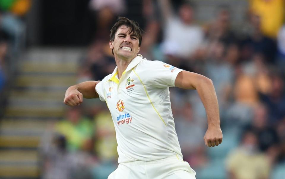 Australia captain Pat Cummins celebrates trapping England captain Joe Root lbw. (PA Media)