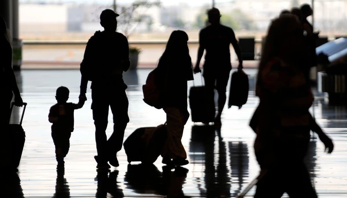 Holiday Travel (Copyright 2023 The Associated Press. All rights reserved)
