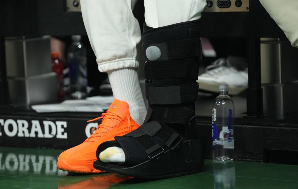 Injured Milwaukee Bucks forward Giannis Antetokounmpo is shown during the first half of their game against the Orlando Magic Wednesday, April 10, 2024 at Fiserv Forum in Milwaukee, Wisconsin.