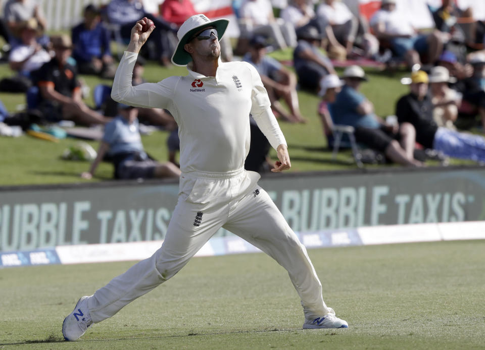 England's Joe Denly throws the ball back to a teammate during play on day two of the first cricket test between England and New Zealand at Bay Oval in Mount Maunganui, New Zealand, Friday, Nov. 22, 2019. (AP Photo/Mark Baker)