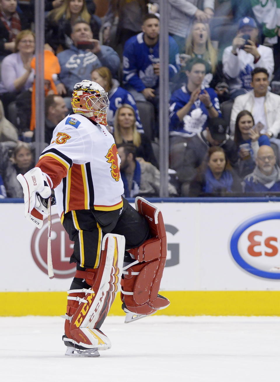 Calgary Flames goaltender David Rittich reacts after making a save to defeat the Toronto Maple Leafs in the shootout of an NHL hockey game Thursday, Jan. 16, 2020, in Toronto. (Nathan Denette/The Canadian Press via AP)