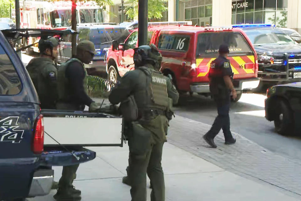 Emergency personnel work at the scene of a shooting in Atlanta (WXIA)