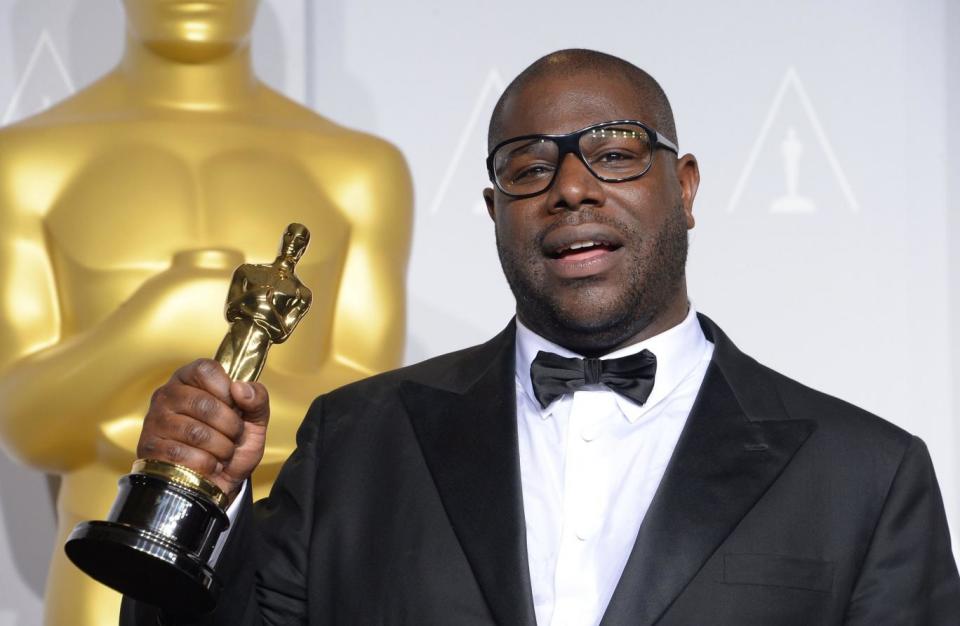 McQueen with his Best Picture Oscar for 12 Years A Slave in 2014 (AFP/Getty Images)