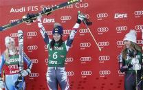 Sweden's Jessica Lindell-Vikarby, Austria's Anna Fenninger and Mikaela Shiffrin of the U.S. (LtoR) stand on the podium after the women's giant slalom World Cup race in the Tyrolean ski resort of Lienz December 28, 2013. REUTERS/Leonhard Foeger