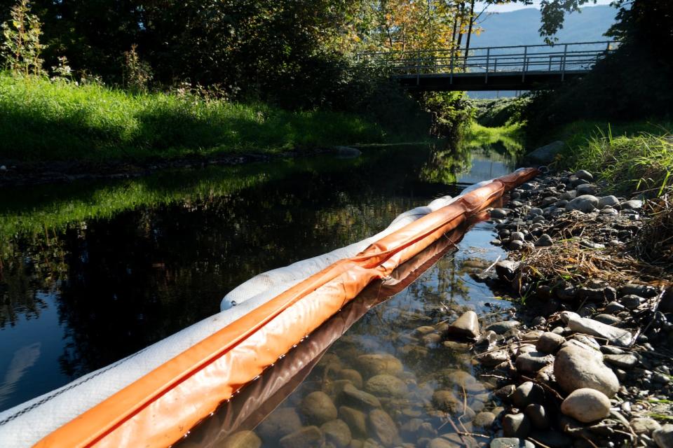 A boom was in place to contain the spill on the Hope Slough near Chilliwack, B.C., on Tuesday.