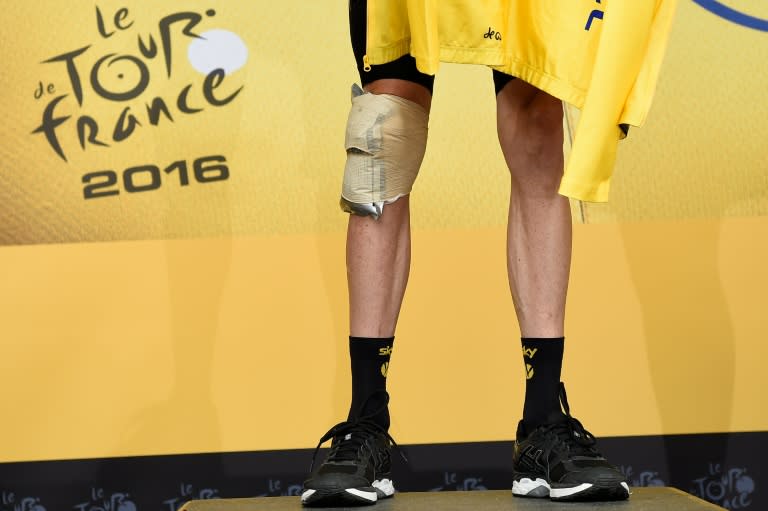 Froome ended Friday's 146km Alpine stage on team-mate Geraint Thomas's bike and with a ripped jersey, while he went up to the podium after the race with a heavily-bandaged knee