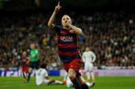 Andres Iniesta celebrates after scoring the third goal for Barcelona. Reuters / Sergio Perez