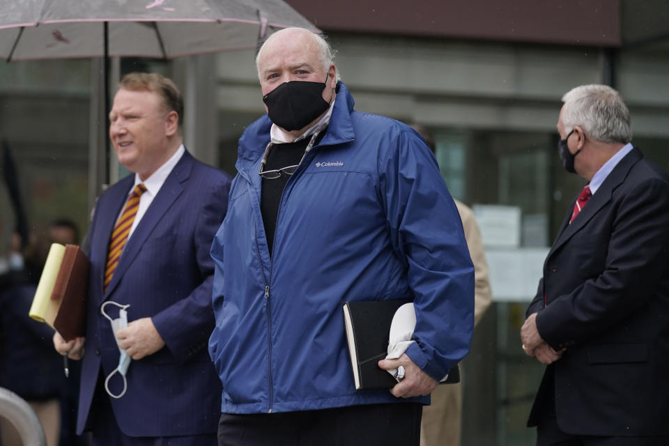 Michael Skakel leaves a courthouse in Stamford, Conn., Friday, Oct. 30, 2020. A Connecticut prosecutor says the Kennedy cousin will not face a second trial in the 1975 murder of teenager Martha Moxley in Greenwich. Chief State's Attorney Richard Colangelo Jr. made the announcement Friday at the state courthouse in Stamford. (AP Photo/Seth Wenig)