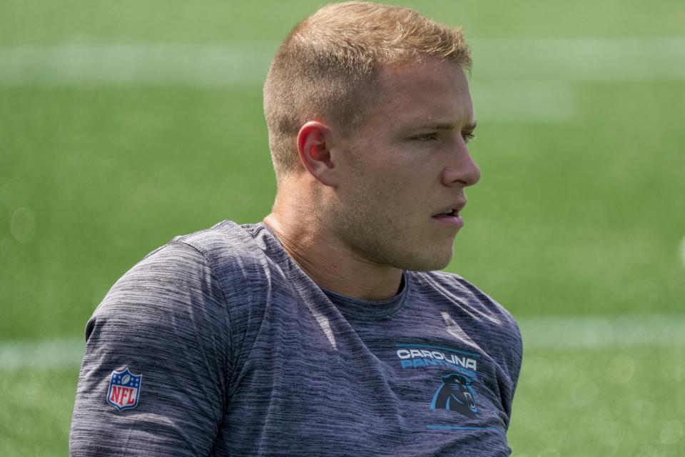 Sep 19, 2021; Charlotte, North Carolina, USA; Carolina Panthers running back Christian McCaffrey (22) during the pregame action New Orleans Saints at Bank of America Stadium. Mandatory Credit: Jim Dedmon-USA TODAY Sports