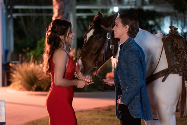 Padgett in her Faviana prom dress and Cameron in his cowboy suit.<p>Photo: Courtesy of Netflix</p>