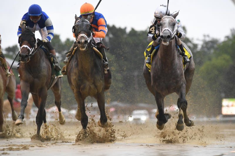 Forte (center) wins the Jim Dandy Stakes at Saratoga, taking command among American 3-year-olds. Photo courtesy of New York Racing Association