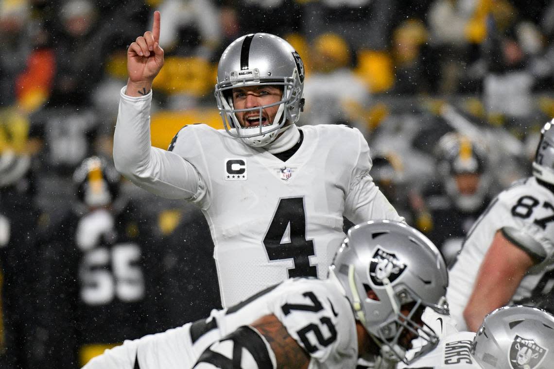 Las Vegas Raiders quarterback Derek Carr calls signals during the first half of an NFL game against the Pittsburgh Steelers in Pittsburgh, Saturday, Dec. 24, 2022. Don Wright/AP