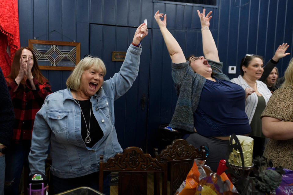 Member of Enid Social Justice Committee Connie Vickers and Leslie Terrell cheer (Michael Noble Jr. for NBC News)