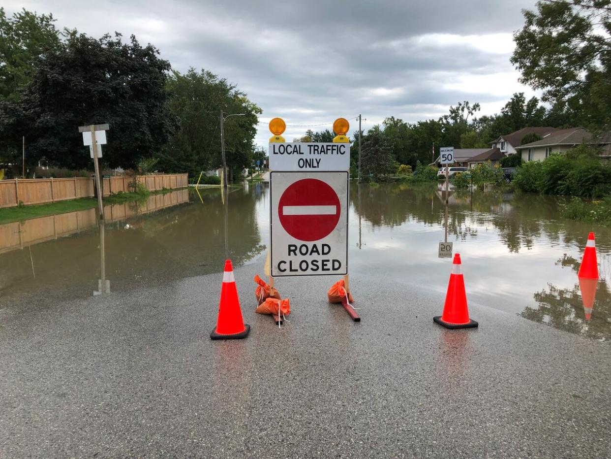 Flooding led to road closures in Essex County in August 2023. (TJ Dhir/CBC - image credit)