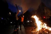 Demonstrators take part in a protest against the increase in the subway ticket prices in Santiago