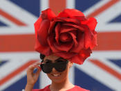 <p>A racegoer during Ladies Day at the Royal Ascot horse races in Ascot, Britain on June 22, 2017. (Toby Melville/Reuters) </p>