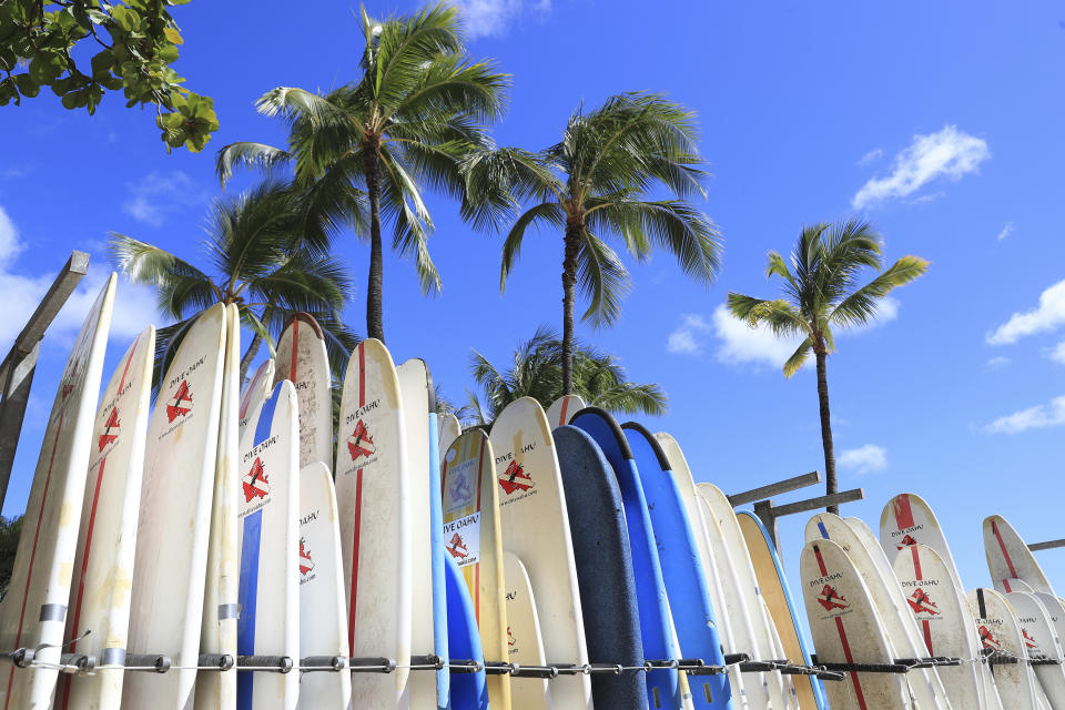 Surfboards line the Waikiki Beach, Thursday, June, 23, 2022 in Honolulu. In a major expansion of gun rights after a series of mass shootings, the Supreme Court said Thursday that Americans have a right to carry firearms in public for self-defense.