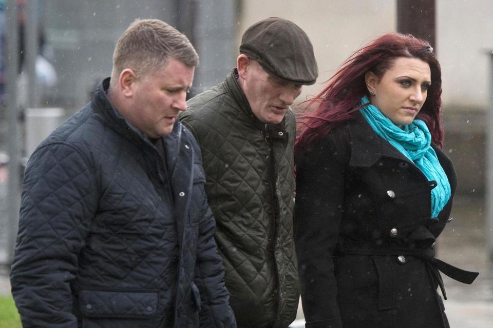 Paul Golding (left) and Jayda Fransen (right) arrive at Belfast Laganside courts on Thursday: PA