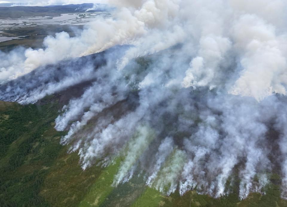 <span class="caption">A large tundra fire burned near St. Mary's, Alaska, on June 13, 2022.</span> <span class="attribution"><a class="link " href="https://www.flickr.com/photos/blmalaskafireservice/52157039455/in/album-72177720299701992/" rel="nofollow noopener" target="_blank" data-ylk="slk:BLM Alaska Fire Service/Incident Management Team/John Kern;elm:context_link;itc:0;sec:content-canvas">BLM Alaska Fire Service/Incident Management Team/John Kern</a></span>