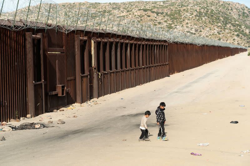 Migrants at U.S.-Mexico border in California