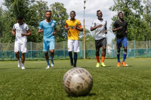 Players of the Black Stars, a team created for African footballers, train at a pitch in the Moscow suburbs