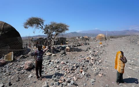 The once nomadic Afar tribe has been forced by climate change to move out of the mountains and discontinue their nomadic lifestyles which became unsustainable as water sources dried up - Credit: Susan Schulman