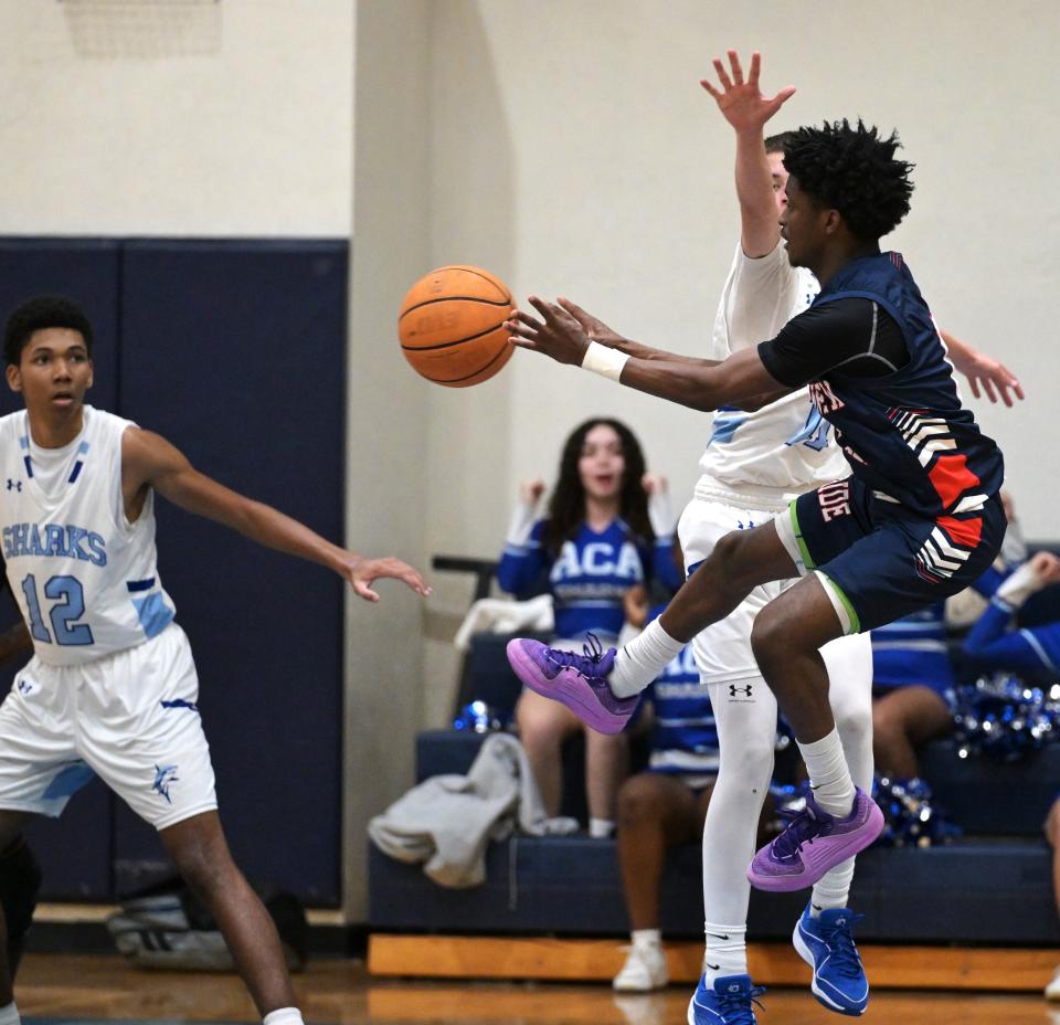 Grandview Prep's Xavian Charles fires a pass toward his teammate during a game against Atlantic Christian on Feb. 15, 2024.