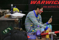 <p>Ringling Bros. clown Ivan Vargas speaks on a video call with his parents during the intermission of a show, Friday, May 5, 2017, in Providence, R.I. Vargas’ parents work with Ringling’s other circus unit, the blue unit, which will be finishing up in Uniondale, N.Y. on Sunday. (Photo: Julie Jacobson/AP) </p>