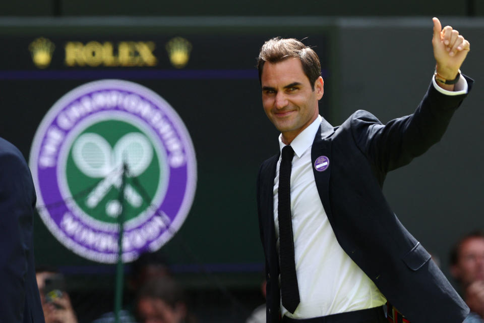 Roger Federer, pictured here waving to the crowd during an appearance at Wimbledon in 2022.