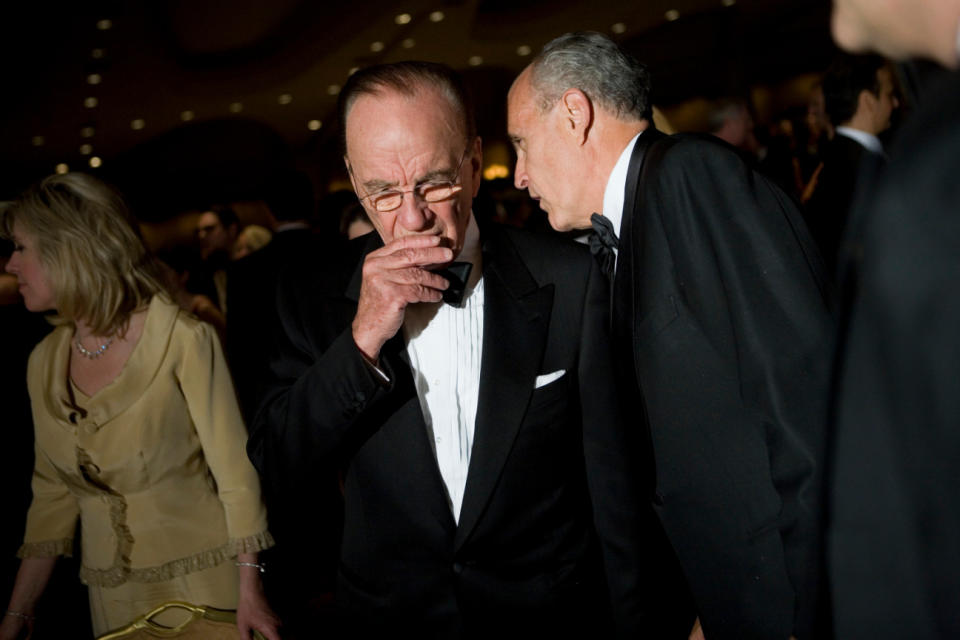 Rupert Murdoch (left) speaks with former New York City Mayor Rudy Giuliani at the White House Correspondents’ Dinner on April 21, 2007 in Washington, D.C.