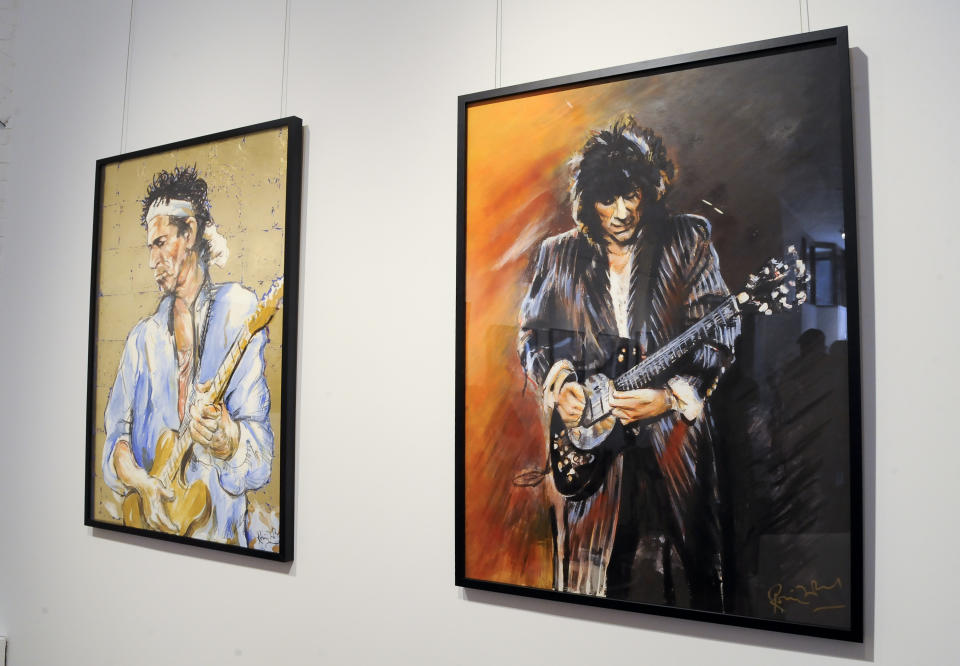 Rolling Stones guitarist Ronnie Wood's art work is on display during a news conference to unveil his new art exhibition "Faces, Time and Places" on Monday, April 9, 2012 in New York. (AP Photo/Evan Agostini)