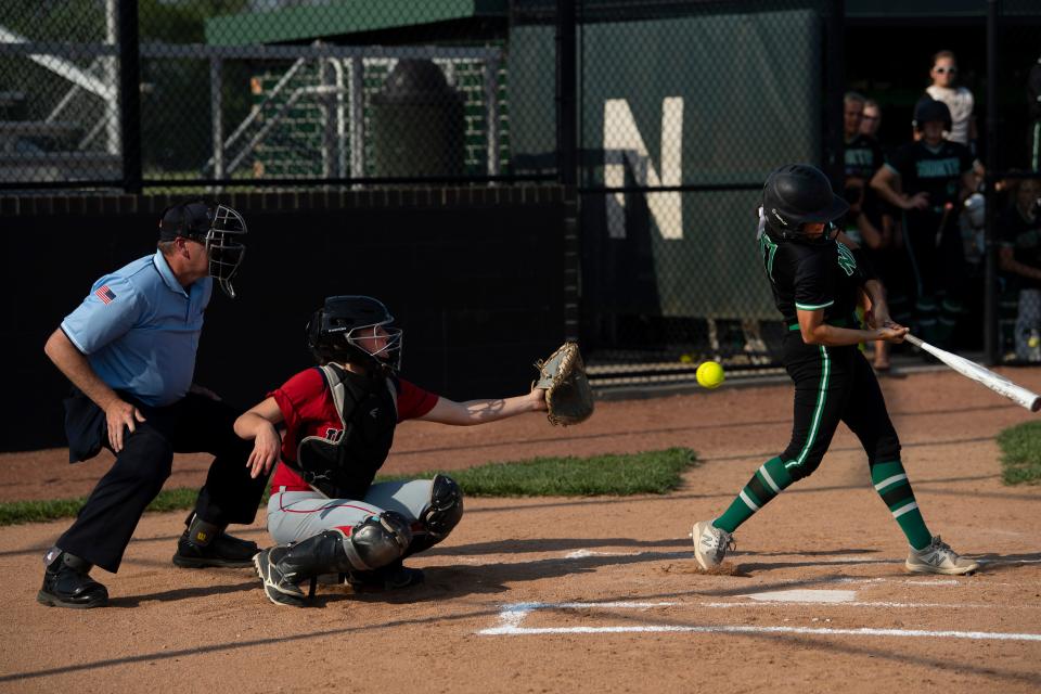 Umpire Steve Seniour of Evansville calls balls and strikes during a North versus Tecumseh softball game at North High School in Evansville, Ind., Tuesday evening, May 10, 2022.