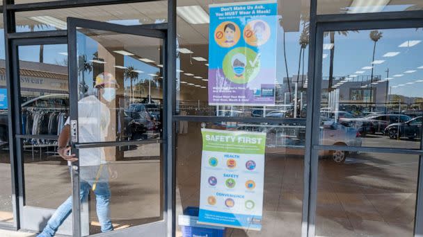 PHOTO: Face mask required sign on the entrance door to a store in Reseda, Calif., Feb. 9, 2022. (Los Angeles Daily News via Getty Images, FILE)