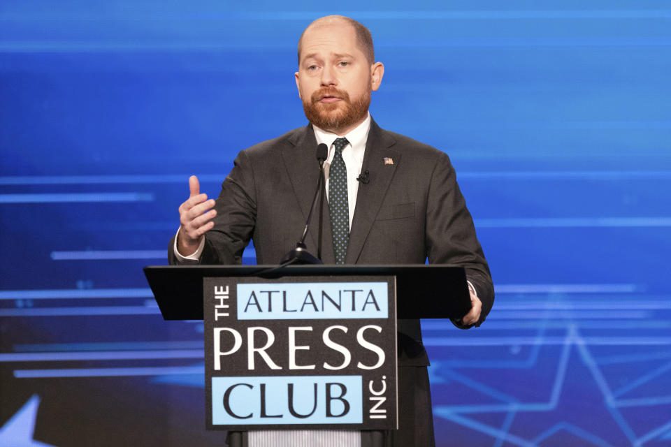 Charlie Bailey, Democratic candidate for Lieutenant Governor of Georgia, participate in the Atlanta Press Club Loudermilk-Young Debate Series with Libertarian Ryan Graham and Republican state Sen. Burt Jones, Tuesday, Oct. 18, 2022, in Atlanta. (Dustin Chambers/Pool Photo via AP)