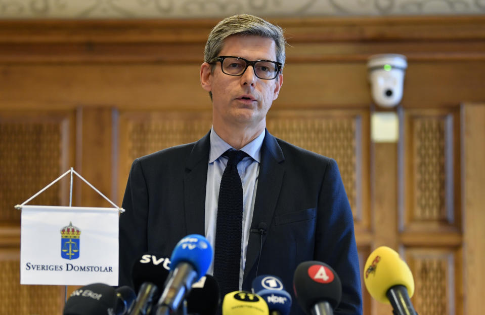 Judge Per Lennerbrant faces the media to comment on the verdict on American rapper A$AP Rocky and two others, at Stockholm District Court, in Stockholm, Sweden, Wednesday Aug. 14, 2019. Swedish court on Wednesday found American rapper A$AP Rocky guilty of assault for his role in a June 30 street brawl in Stockholm. (Anders Wiklund / TT via AP)