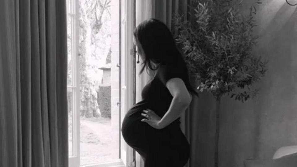 Meghan Markle wearing black dress while pregnant with Lilibet