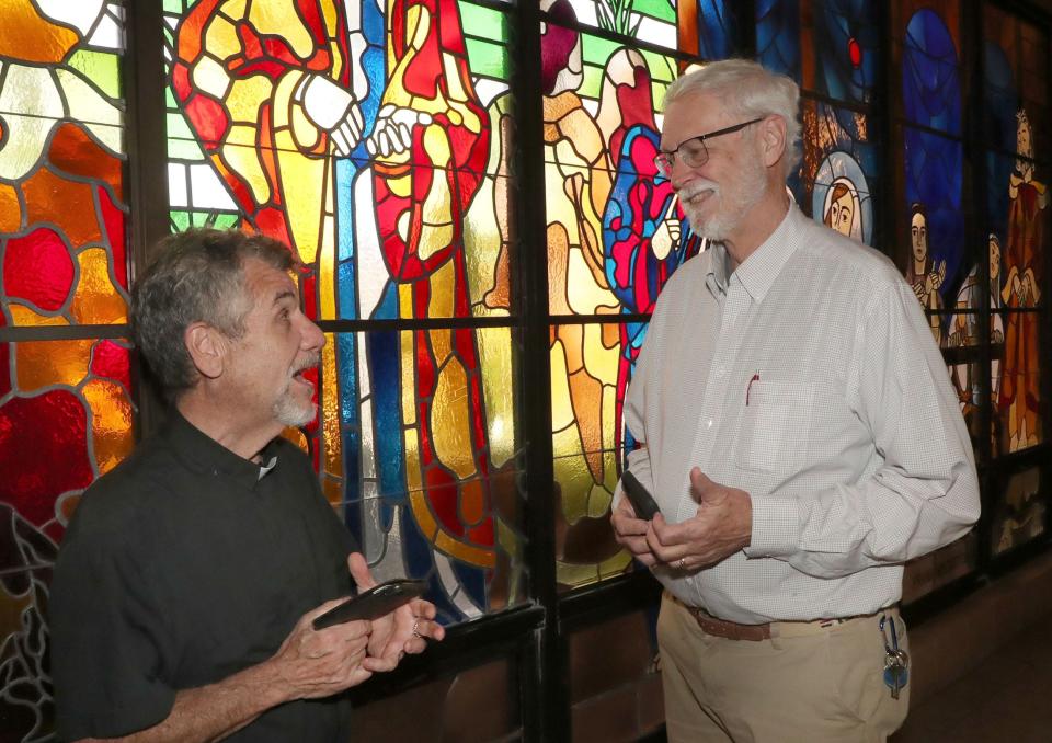 Father Phil Egitto,pastor at Our Lady of Lourdes Catholic Church in Daytona Beach, discusses preparations for Easter Sunday sunrise services with Paul Thompson, the church's operations director. The church will host its annual Easter sunrise service for the community at 7:30 a.m. Sunday on the beach behind the Daytona Beach Bandshell.