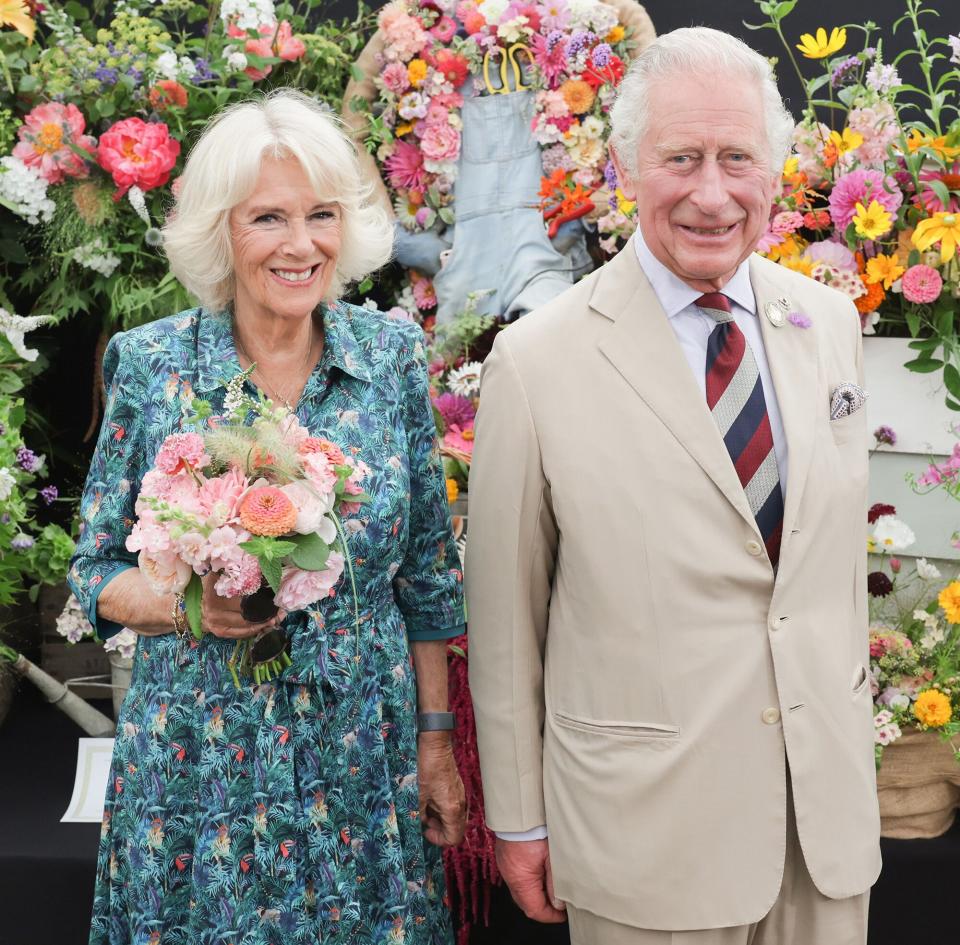 Prince Charles, Prince of Wales and Camilla, Duchess of Cornwall pose at The Sandringham Flower Show 2022 at Sandringham on July 27, 2022 in King's Lynn, England