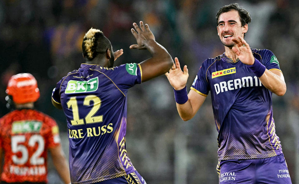 Mitchell Starc and Andre Russell during the IPL final.