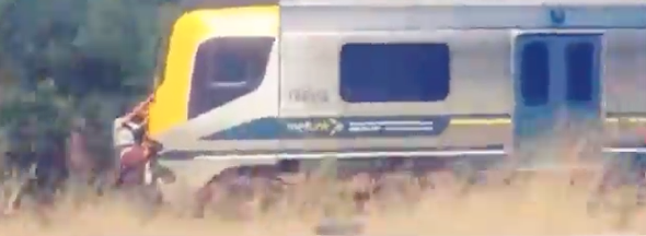 Two men filmed 'train surfing' in New Zealand (video)
